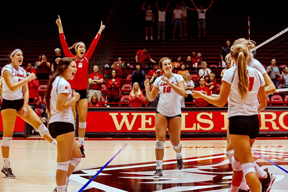 UNMs volleyball team celebrates game point against Montreal Friday Sept. 9, 2016 at WisePies Arena.&nbsp;