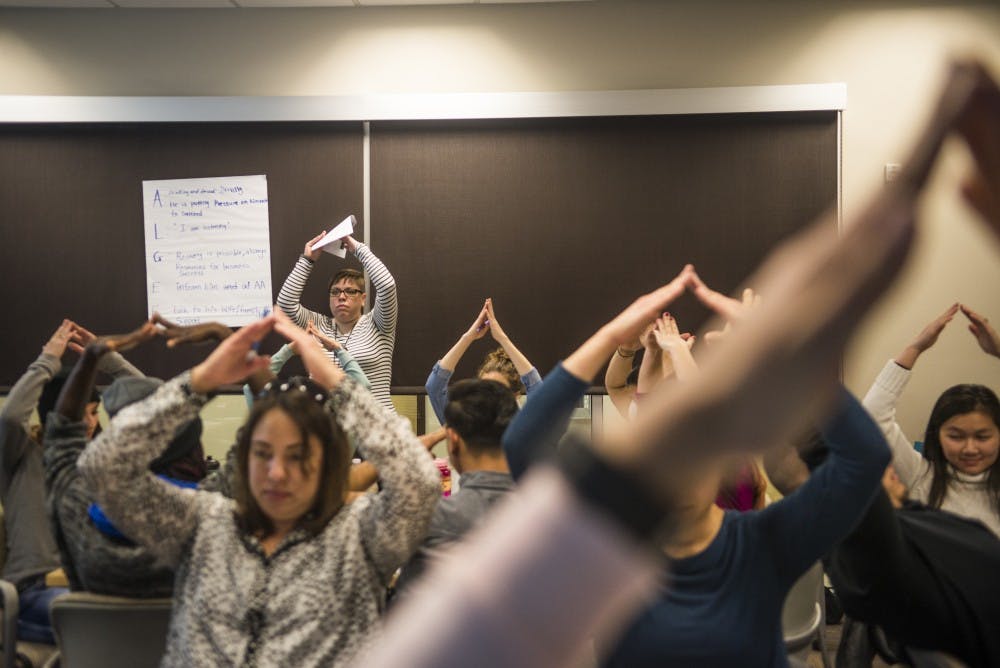 Students participate during an in-class exercise Tuesday, Feb. 14, 2017. The Office of Interprofessional Education aims to teach nursing and medical students how to assist people with a mental health crisis.