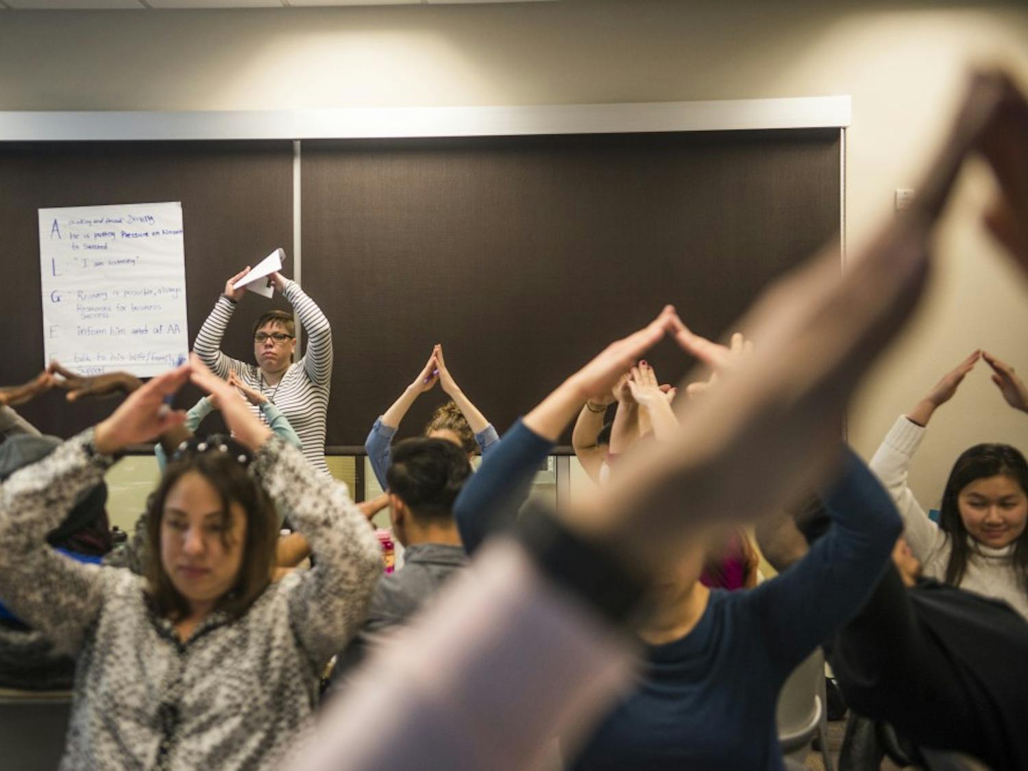 Students participate during an in-class exercise Tuesday, Feb. 14, 2017. The Office of Interprofessional Education aims to teach nursing and medical students how to assist people with a mental health crisis.