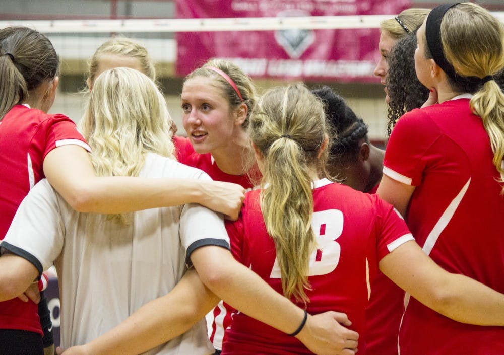 	Lobo redshirt junior setter Hannah Johnson encourages the team after their loss against the Texas Longhorns Friday night at Johnsons Gym. The Lobos lost to a 0-3 outcome.