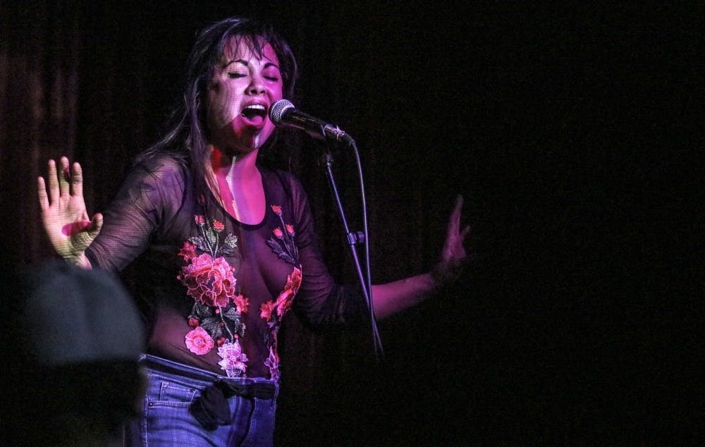 Lead singer Amanda Machon of Red Light Cameras performs at Sister Bar on March 7, 2018.