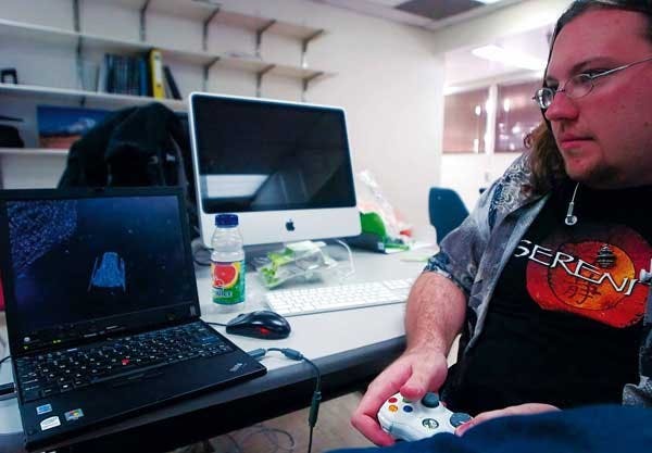 Student Will McMain plays his video game "Star Killer" during a computer graphics class Tuesday. Today, students can play and vote on video games created by the class in the Electrical and Computer Engineering Building.
