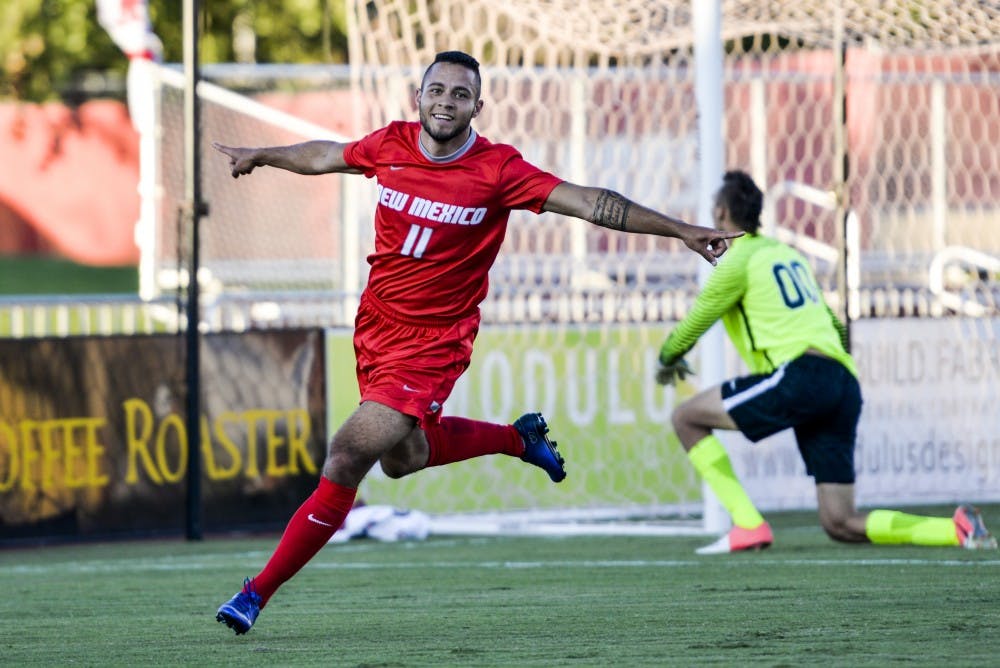 Senior forward Niko Hansen runs past a downed UNLV goalkeeper after scoring against him on&nbsp;Monday, Aug. 15, 2016 at the UNM Soccer Complex. The Lobos defeated Florida International University on Friday 4-1.&nbsp;