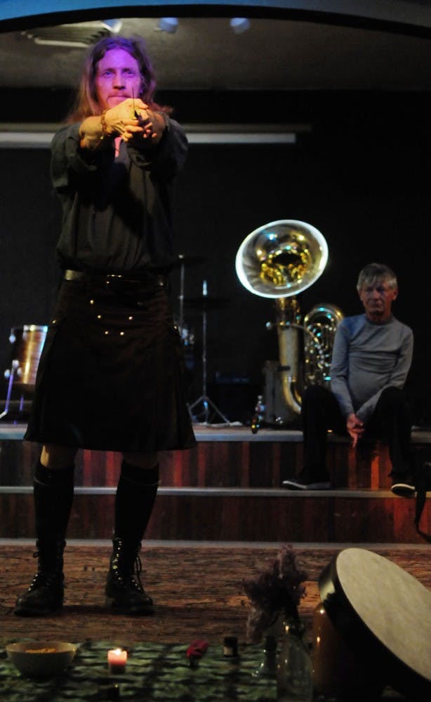 	Cedar Love, a Wicca practitioner, presides over the opening ceremony of White History Week, an event held to combat racism
by encouraging dialogue.