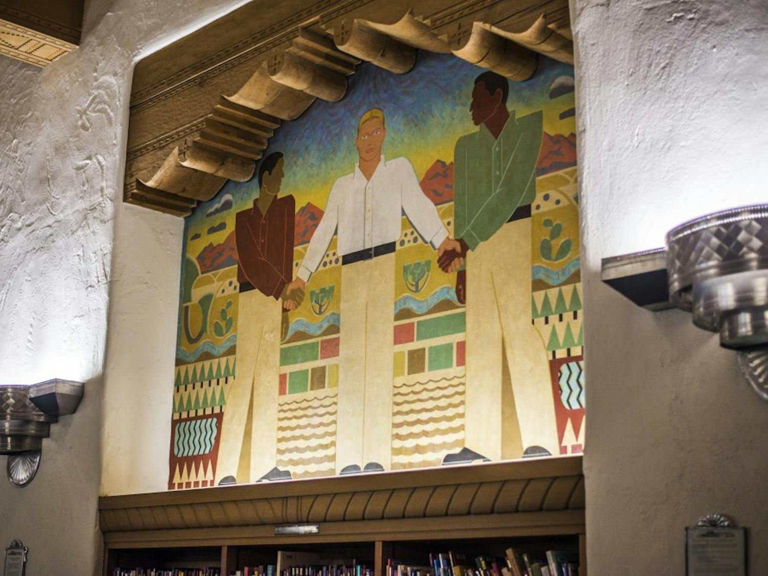 Kenneth Adams' 1939 mural sits in the West Wing of Zimmerman Library. The mural is one of four that has faced scrutiny for having racist undertones.