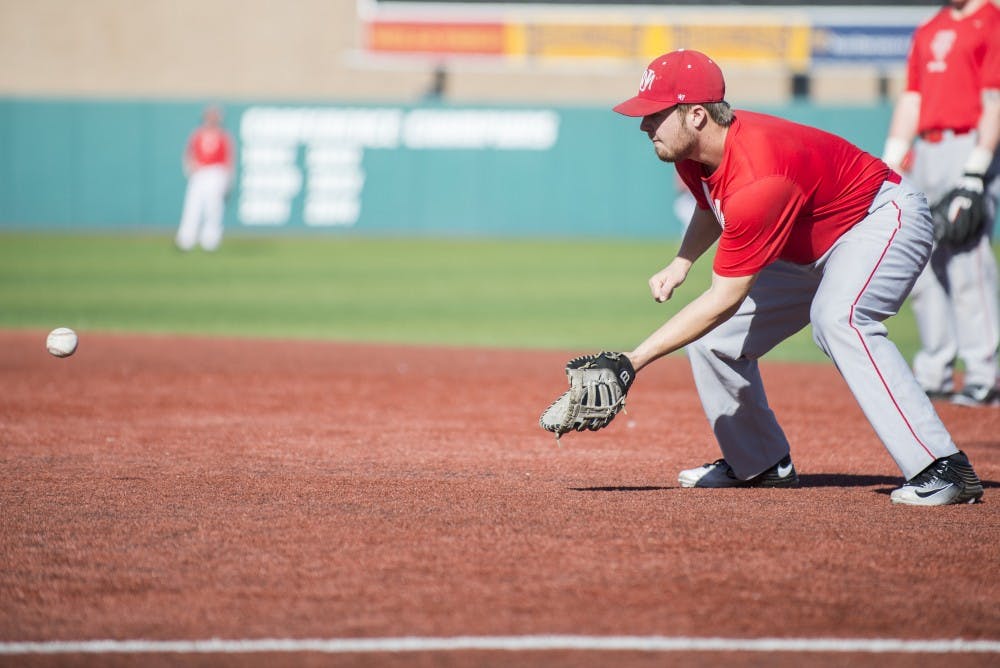 Junior first baseman Jack Zoellner reaches down to catch a low ball at the Lobo's first practice at the Santa Anna Star Field. The Lobos&nbsp;