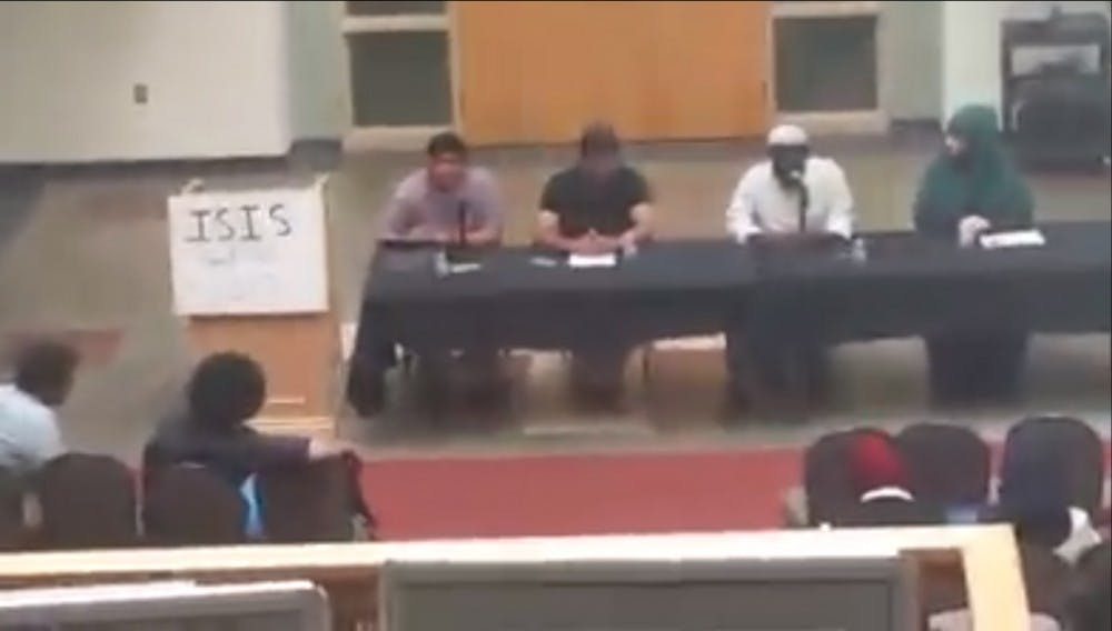 In this still image captured from video filmed by Michael Noah Guebara, a panel discusses ISIS during a Islamic Awareness Week event Wednesday at the SUB atrium. Participants on the panel said they talked about the radical nature of ISIS not coinciding with Muslim belief, but Guebara in the video called the event ?pro-ISIS.? Guebara posted the video on his Facebook profile.