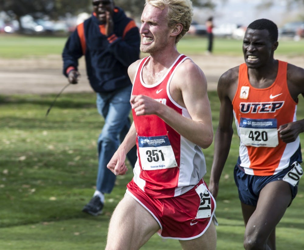 Lobos Elmar Engholm powers past a UTEP runner during the NCAA Cross Country Championships Nov. 11, 2014. The Lobos will be running at the Joe Piane Notre Dame Invitational this Friday in South Bend, Indiana. 