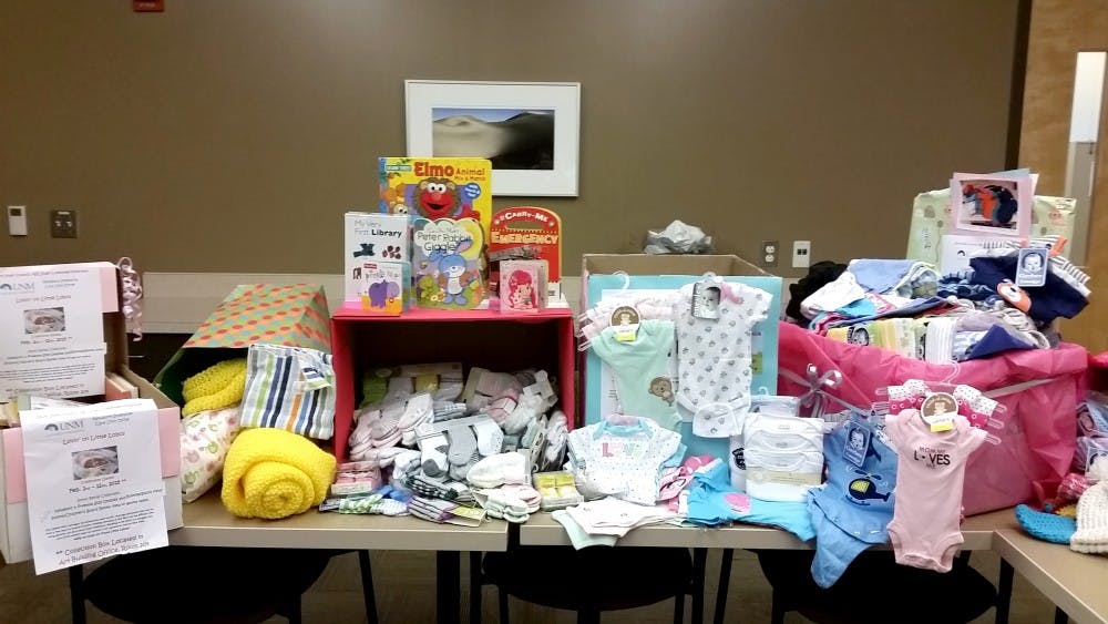 A table is filled with donations to children that are admitted to the Newborn Intensive Care Unit. The donations are part of a two-week drive titled Lovin' on Little Lobos.&nbsp;