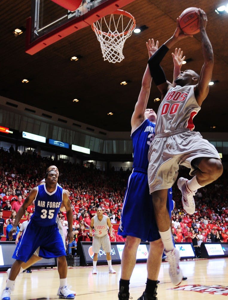 	Forward A.J. Hardeman shoots past Air Force’s Mike McLain. The Lobos look to solidify the Mountain West Conference regular-season title tonight against TCU. 