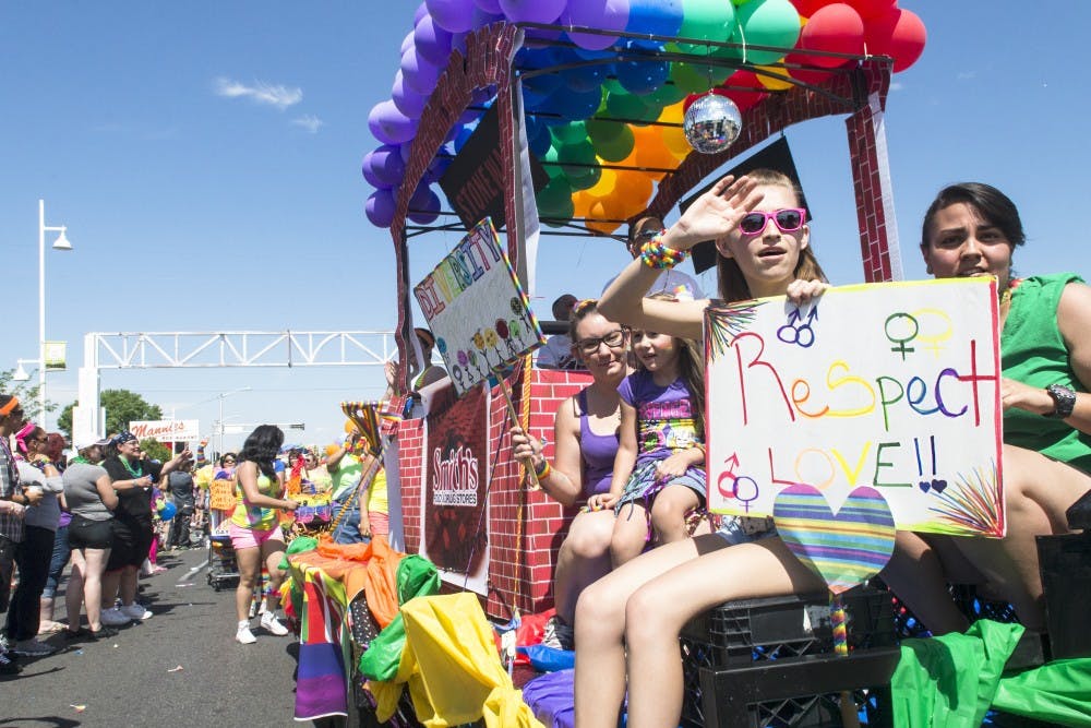 Participants wave at parade goers at the Gay Pride Festival in 2014. This years Pride Parade will take place on June 13.  