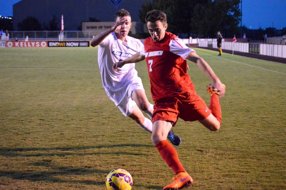 Lobo's midfielder Josh Goss prepares to shot on goal while being defended by a San Diego player Friday Sept. 4, 2015. The Lobos play Missouri State Sept. 18 at 7 p.m.. 