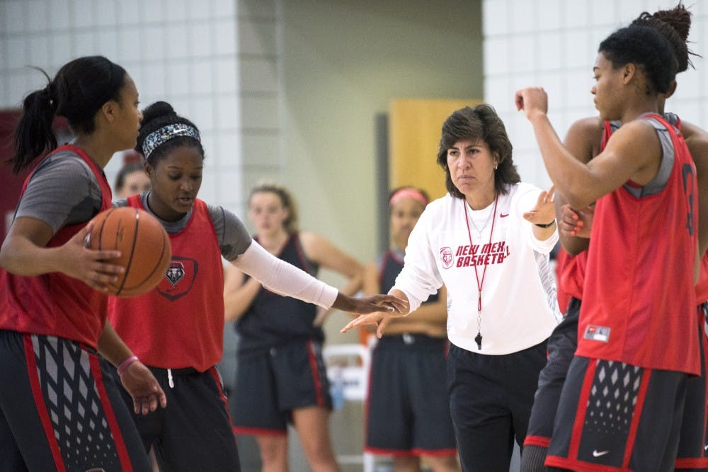 New Mexico women’s basketball head coach Yvonne Sanchez, center, goes over plays with her team during Saturday’s practice. The Lobos were picked to finish ninth in the Mountain West preseason poll, following last year’s 11-19 finish.