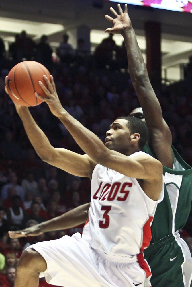 	Curtis Dennis attempts a layup against Eastern New Mexico on Nov. 3 at The Pit. Dennis will look to become a valuable asset to the Lobos this season for head coach Steve Alford as a member of the Lobos’ bench.