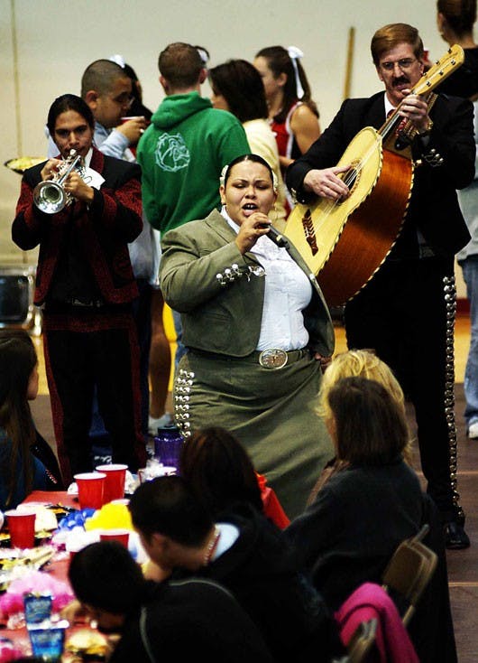 The Lobo Mariachi Band performs for visiting high school students during Hispano Student Day in Johnson Center on Thursday.