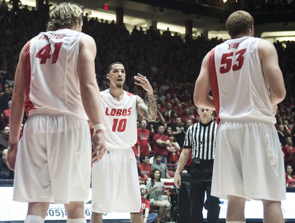 	New Mexico guard Kendall Williams, 10, calls on forward Cameron Bairstow, 41, and center Alex Kirk, 53, to review a play during a Feb. 22 games against San Diego State. The trio are among the potential picks for the 2014 NBA daft on June 26.