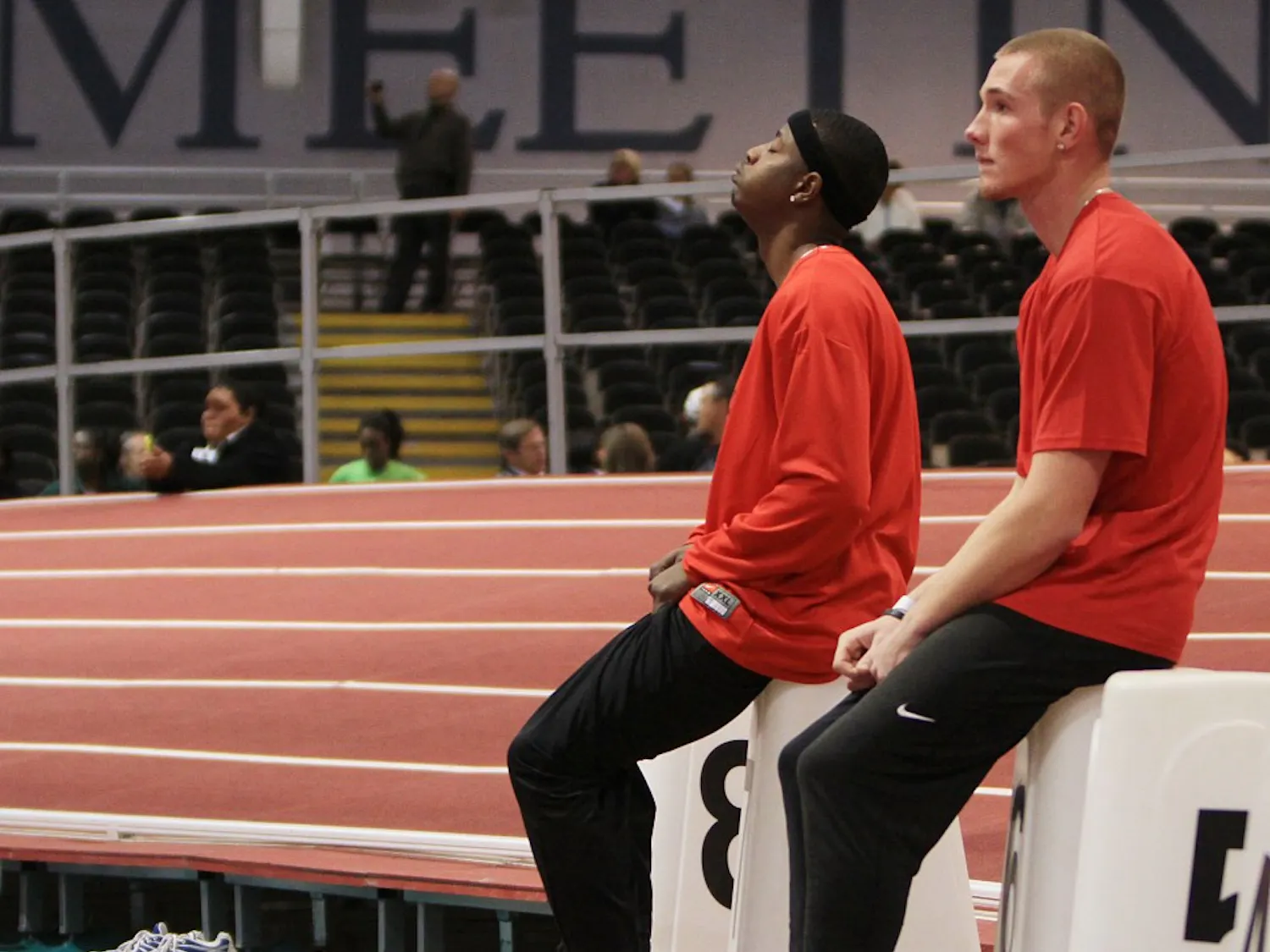 Freshman Ty Kirk, left, and teammate, Zach Smith, prepare for the preliminary round of the men’s 60-meter dash on Saturday