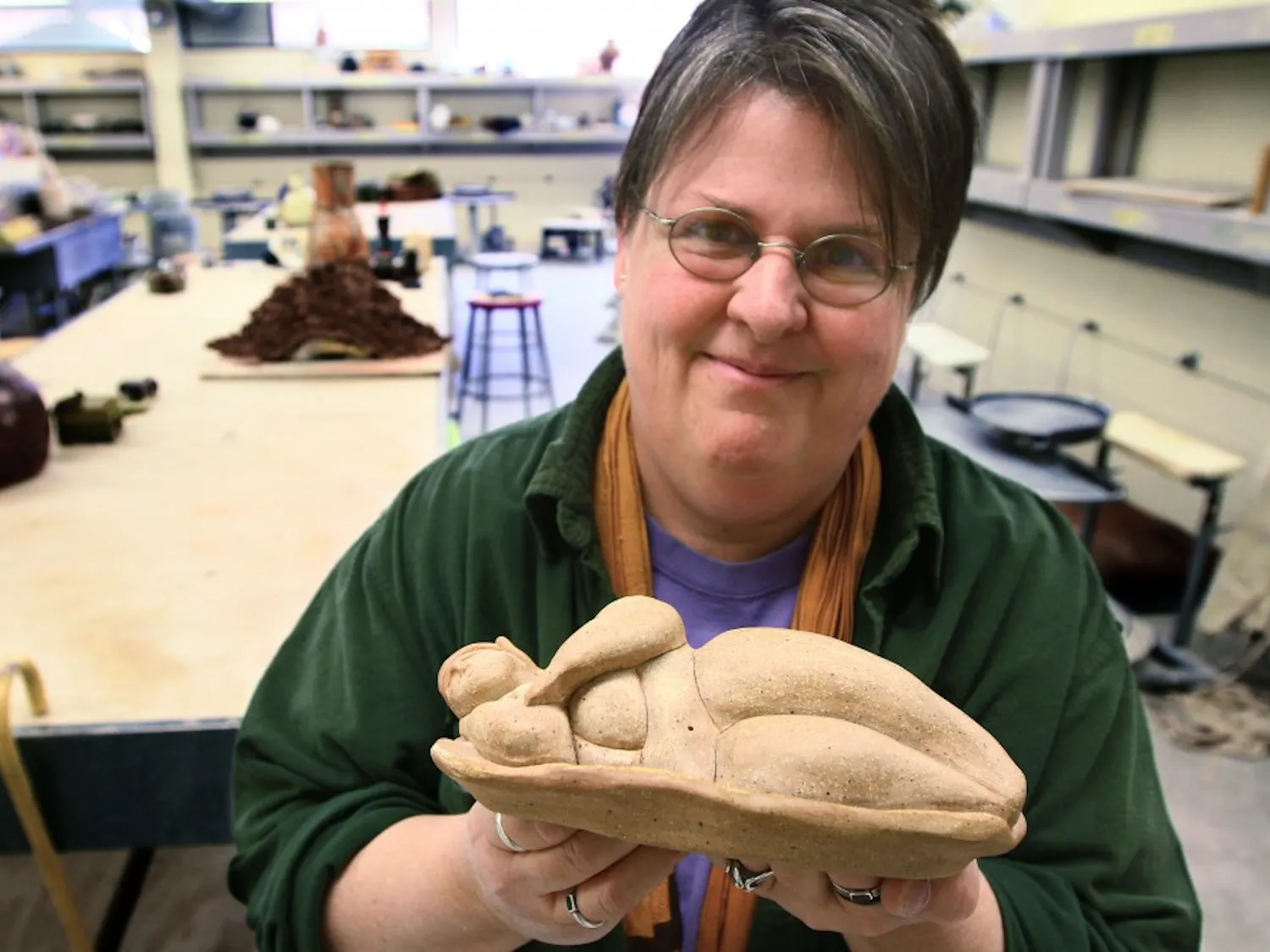 Raven White offers one of her projects on Monday in the Art Building. She did this piece as an assignment for her ceramics class but said she probably won’t continue with ceramics, because her main focus is on photography and drawing.