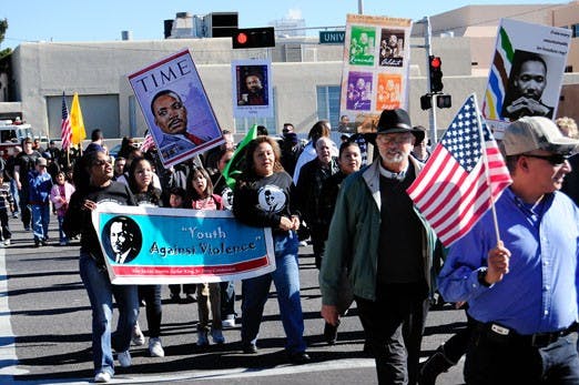Demonstrators march near campus on Sunday in celebration of Martin Luther King Jr. Day.