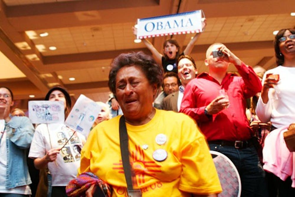 Serma Jhallwood reacts to Barack Obama's victory Tuesday at the Albuquerque Convention Center.
