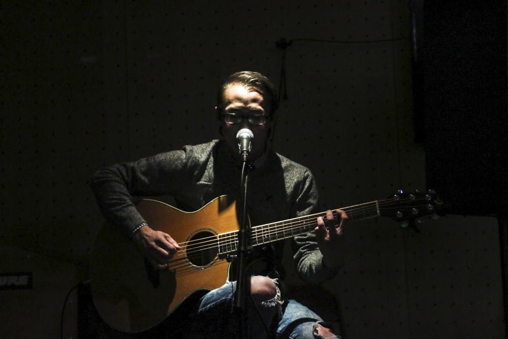 Singer-songwriter Malcolm Reese performs a set at Brickyard Pizza on&nbsp;Tuesday, Feb. 7, 2017. Reese is a local Albuquerque musician that performs solo projects as well as being the vocalist to another local band, Dakota Ave.