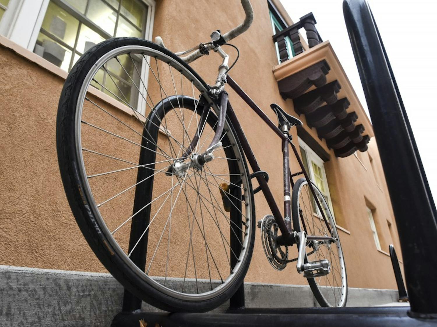 A bike sits locked up on the UNM Campus on the afternoon of Feb. 21, 2018.