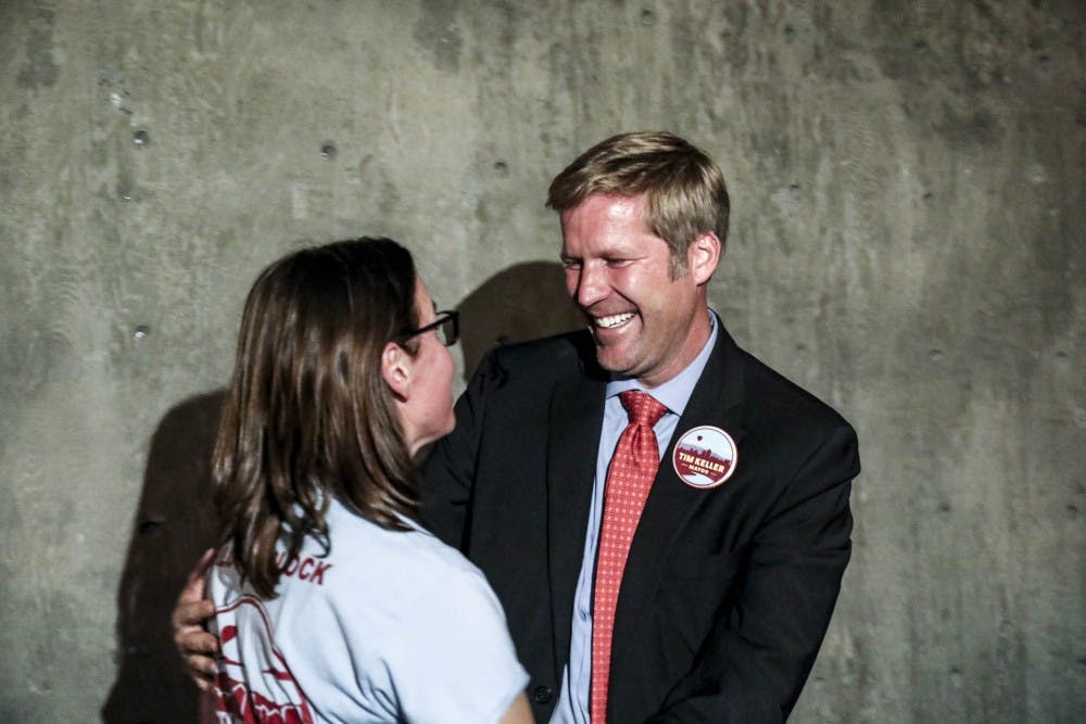 Timothy ?Tim? Keller embraces his wife Elizabeth Kistin Keller during his mayoral election watch party on Oct. 3, 2017 at Red Door Brewing Company. 