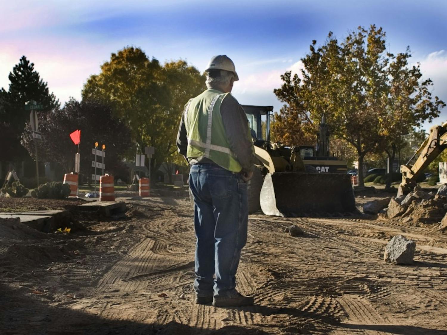 Guzman Construction project manager Tom Kryfko overlooks the removal of sidewalk and curb along Lead Avenue on Thursday. Construction on the one-way avenue, from Oak street and Washington street, is expected to be completed in eight months.
