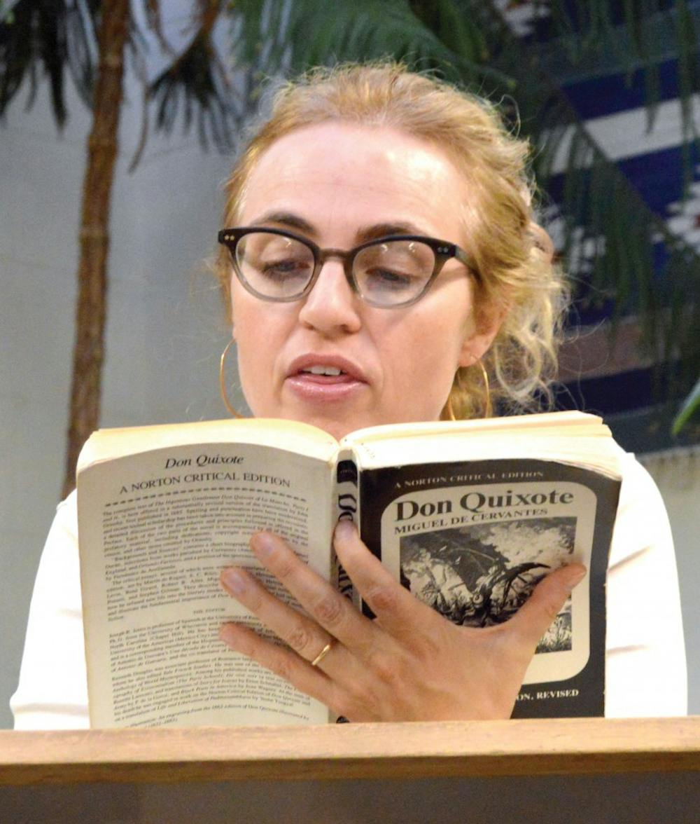 Mary Quinn reads an English translation of Don Quixote to an audience on Wednesday night at the reading room in Ortega Hall. The Spanish/Portuguese celebrate the fourth centennial anniversary celebration of Cervantes: Don Quixote.