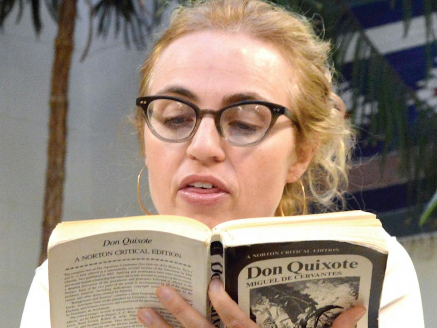 Mary Quinn reads an English translation of Don Quixote to an audience on Wednesday night at the reading room in Ortega Hall. The Spanish/Portuguese celebrate the fourth centennial anniversary celebration of Cervantes: Don Quixote.