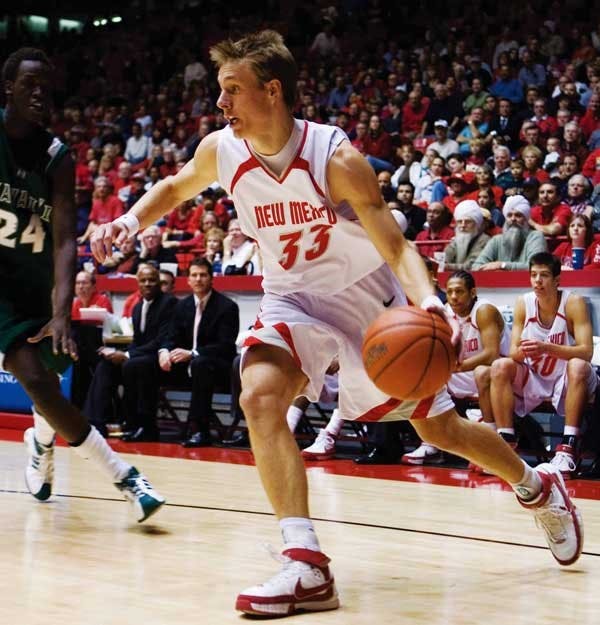 UNM's Chad Toppert takes the ball inside for a layup during Wednesday's game against Hawaii at The Pit. The Lobos won 89-60. 