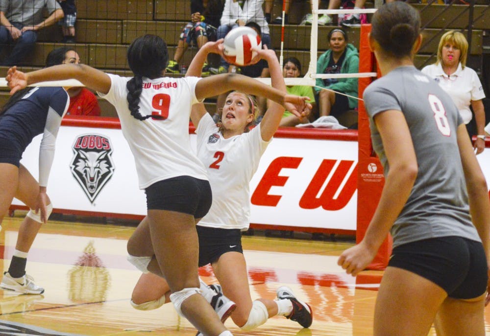 Lobo redshirt junior setter Hannah Johnson (2) keeps the ball in play during the game against Utah State on Oct. 2. The Lobos will play against Colorado State at Johnson Gym on Thursday night at 7 p.m.