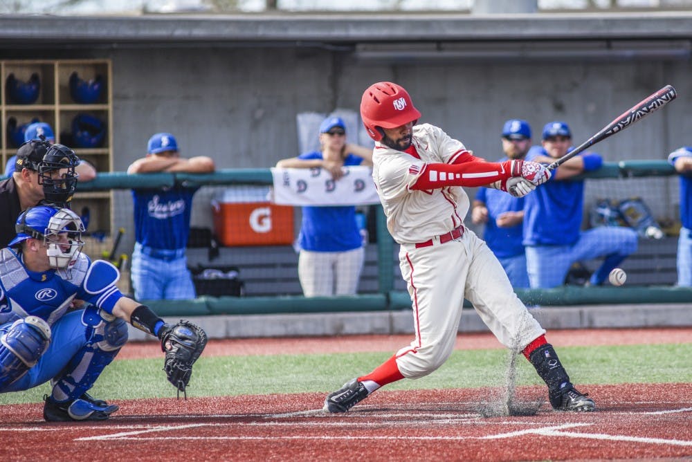 Senior Andre Vigil chips away at a ball during the lobos second games against San Jose State University Saturday, March 11, 2017 at Santa Ana Star Field. The Lobos defeated the Spartans 16-8.