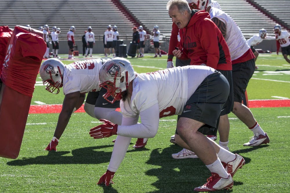 Redshirt junior defensive lineman Johnny Williams runs drills during the Lobo’s second season practice at University Stadium. Williams before playing coming onto the Lobos trained as an MMA fighter.