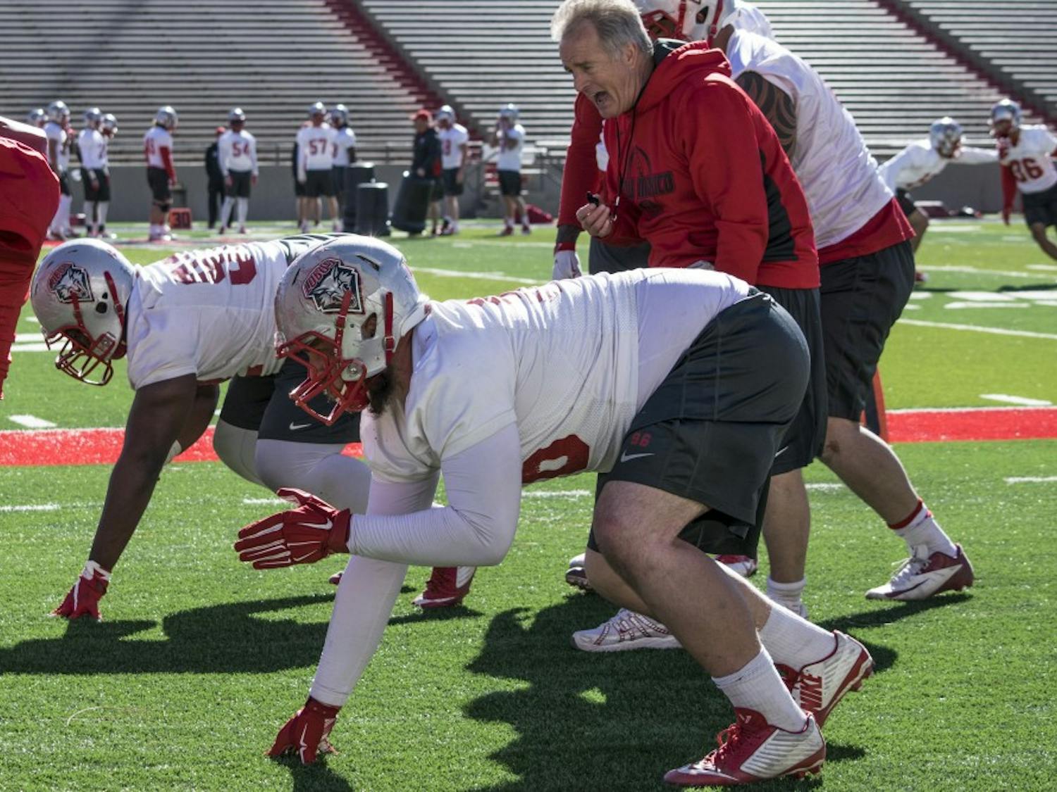 Redshirt junior defensive lineman Johnny Williams runs drills during the Lobo’s second season practice at University Stadium. Williams before playing coming onto the Lobos trained as an MMA fighter.