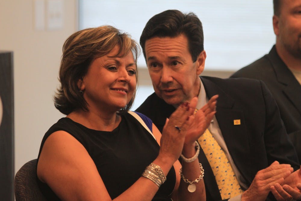 New Mexico Gov. Susana Martinez, and state Economic Development Secretary Jon Barela join in a round of applause as a press conference Sept. 10 at the Rio Rancho City Hall. Martinez and Barela were on hand to help announce that S&amp;P Data will have a call center in the city. The center is expected to bring in 400 jobs.