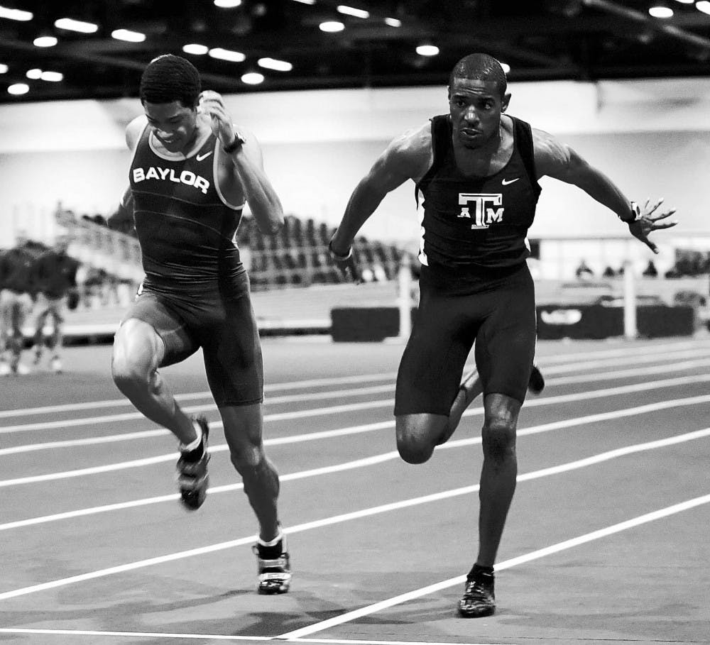 Baylor sprinter Trey Harts and Texas A&M runner Richard Adu-Bobie cross the finish line after the men's 200-meter dash at the Modrall Sperling Lobo Invitational Indoor Track Meet at the Albuquerque Convention Center on Saturday.