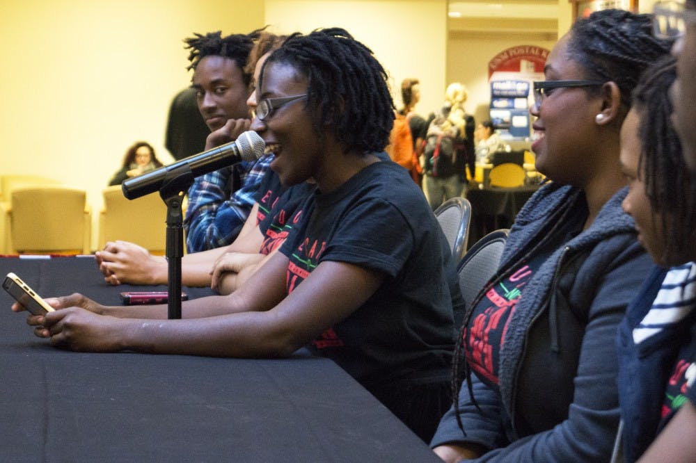 Jacklyn Asamoah, a medical student at University of New Mexico represents the Black Out event on&nbsp;Thursday evening. The&nbsp;event was held in the SUB Atrium were local community campus members&nbsp;talked&nbsp;about the&nbsp;situation that african americans&nbsp;face in everyday life.