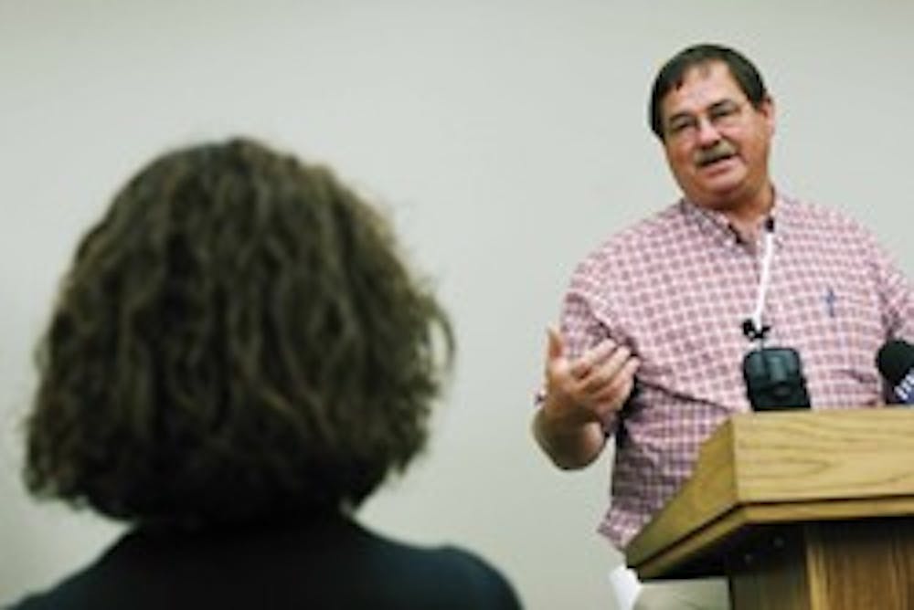 Sen. Tim Jennings emphasizes how students with the Lottery Scholarship at New Mexico colleges need to help incoming Lottery Scholarship recipients, at the 10th anniversary of the scholarship's inception. ASUNM President Brittany Jaeger, left, also attende