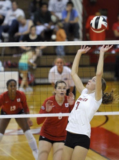Lobo Jade Michaelsen sets up a spike during Saturday's 3-1 loss to Utah. UNM is 13-3 overall and 3-2 in the Mountain West Conference. 