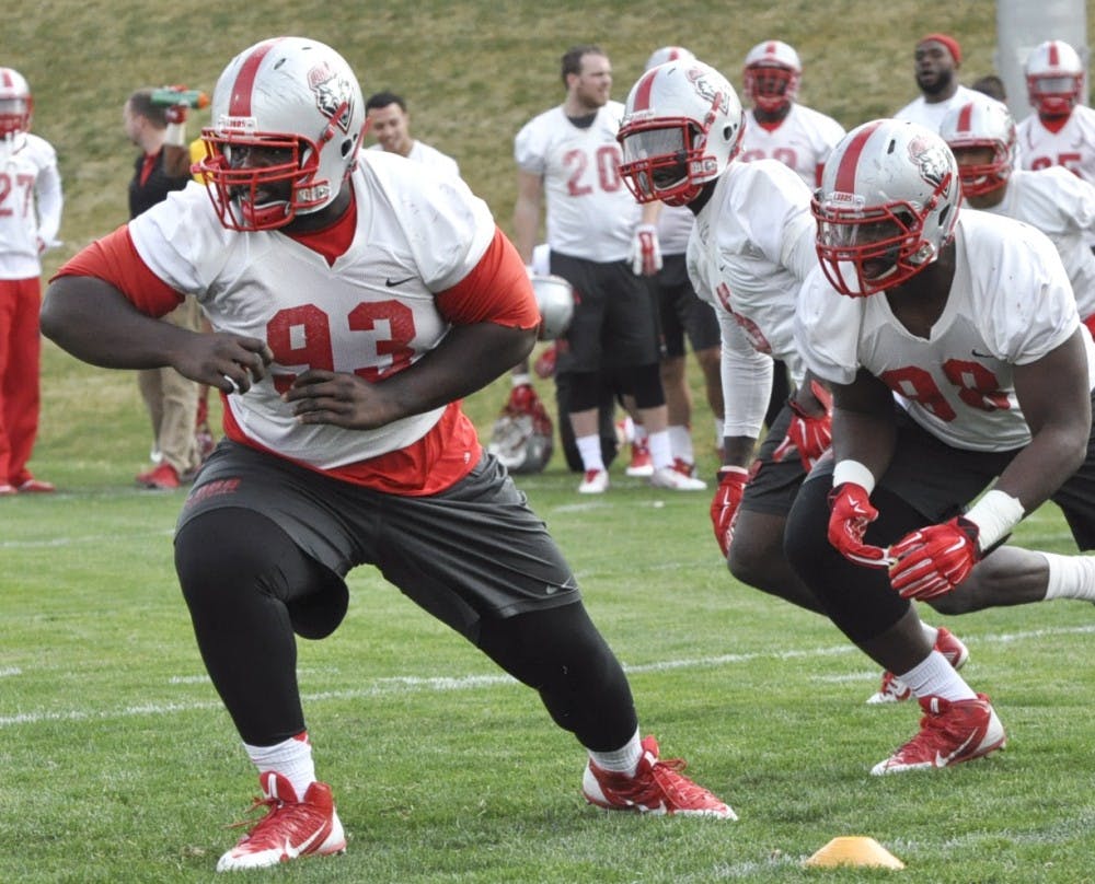 Redshirt sophomore defensive end Dominic Twitty runs drills at the Tow Diehm complex for the Lobos spring practice on Wednesday morning. 