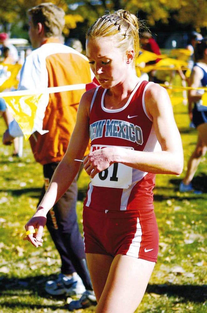 Lobo runner Timmie Murphy looks at her results after running in the 2006 NCAA Cross Country Championships Mountain Regional at the UNM North Golf Course on Nov. 11. Murphy will run at the NCAA Championships on June 6-9 in Sacramento, Calif.    