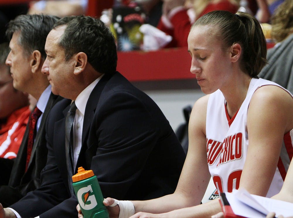 	Sara Halasz sits on the bench after being substituted in Wednesday’s game against UNLV at The Pit. UNM lost but looks to redeem itself
Saturday against Utah.