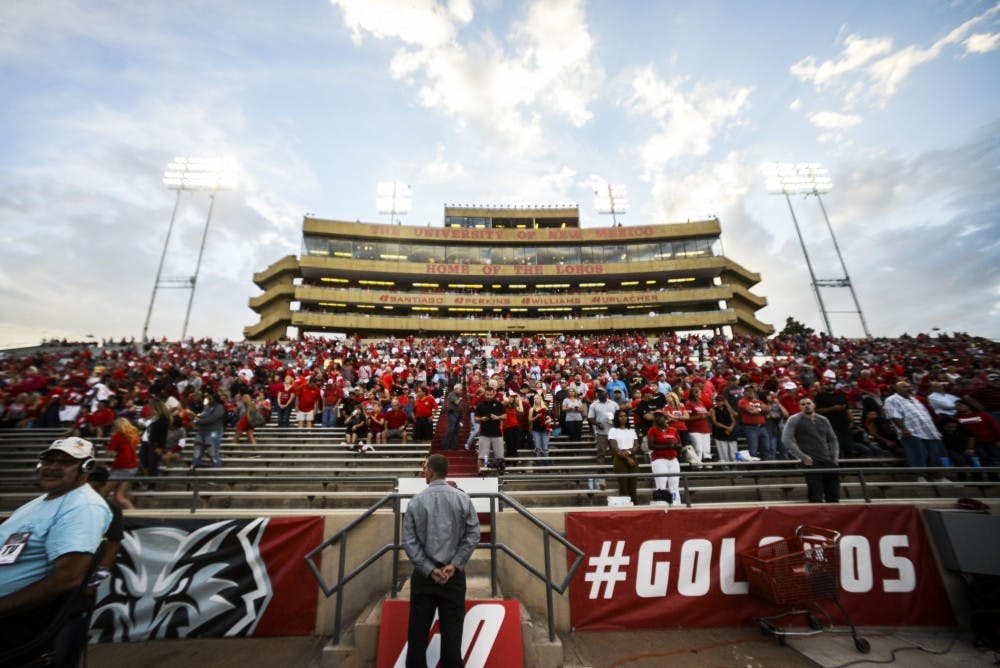 Attendees to the Thursday Sept. 1, 2016 UNM Football game at University Stadium stand and wait for the game to begin. UNM Athletics has now allowed liquor and beer sales to take place at select sporting events.&nbsp;