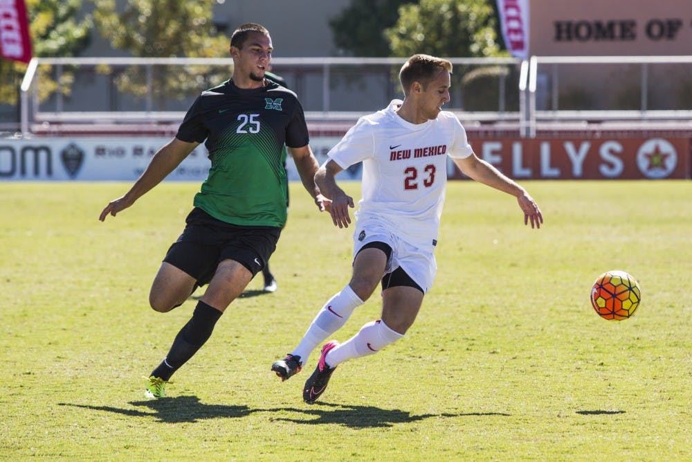 Junior forward Sam Gleadle evades a Marshall player at University Stadium on Saturday, Oct. 22, 2016. The Lobos beat UAB 1-0.&nbsp;