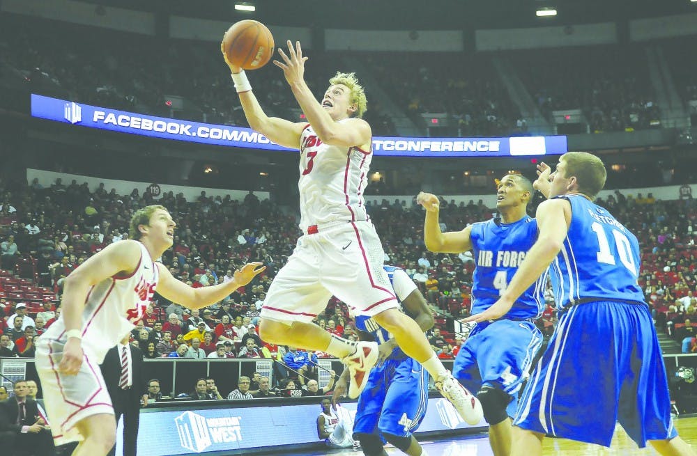 Freshman guard Hugh Greenwood attempts a layup in the second half of UNM's game last night against Air Force in the first round of the MWC Tournament at the Thomas & Mac Center. UNM won the game 79-64 thanks to 19 points from sophomore guard Demetrius Walker.