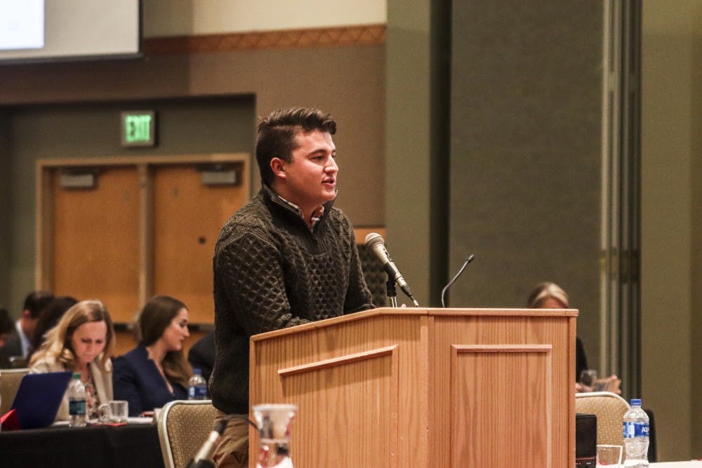 ASUNM President Noah Brooks addresses the Board of Regents at the Budget Summit on March 22, 2018.
