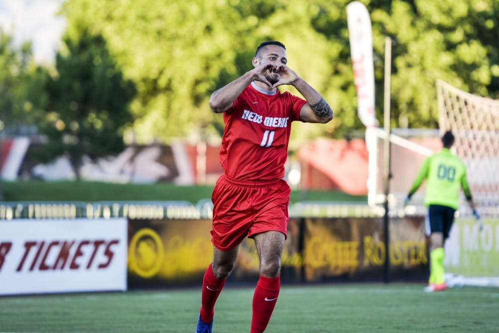 Senior forward Niko Hansen puts up his hands in the shape of a heart after scoring a goal against UNLV Monday August 15, 2016, at the UNM Soccer Complex. The Lobos will play Indiana University this Friday in South Bend, Indiana.