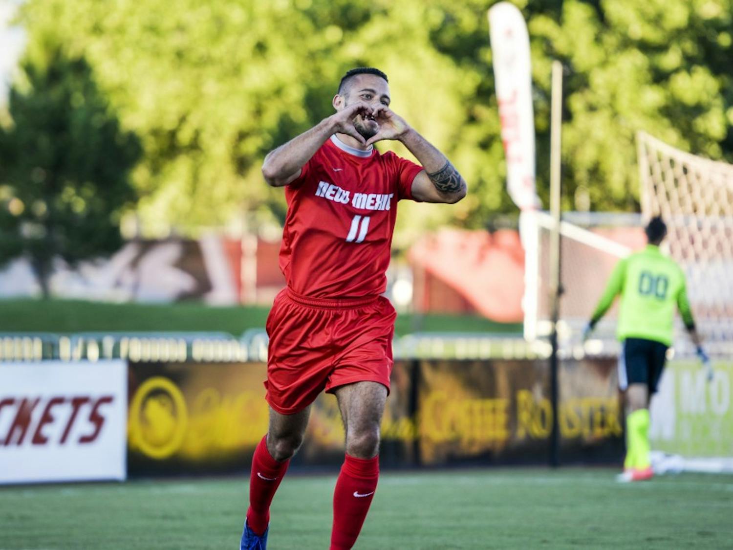 Senior forward Niko Hansen puts up his hands in the shape of a heart after scoring a goal against UNLV Monday August 15, 2016, at the UNM Soccer Complex. The Lobos will play Indiana University this Friday in South Bend, Indiana.