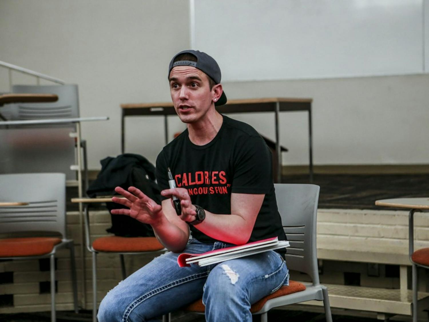 Josh Robbins talks to UNM students about being HIV positive and his personal journey at UNM’s Kiva Hall on Oct. 25, 2017. Robbins’ personal blog, “I’m Still Josh,” gives HIV positive individuals a place to talk and find resources.
